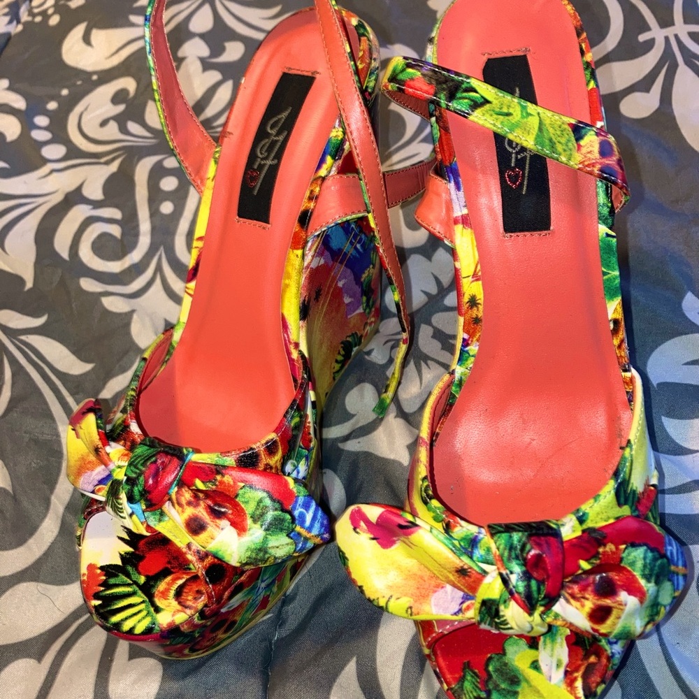 Eye catching  summer wedge! Never worn! Size 38, fits like women’s size 7
